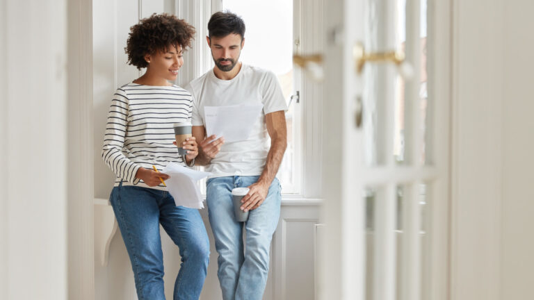 home-buyers-reading-leap-home-loans-bond-application-documents.jpg